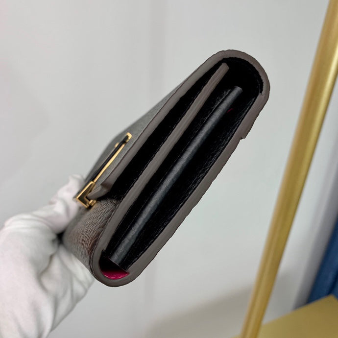 ルイヴィトン ポルトフォイユ カプシーヌ トリヨン ノワール